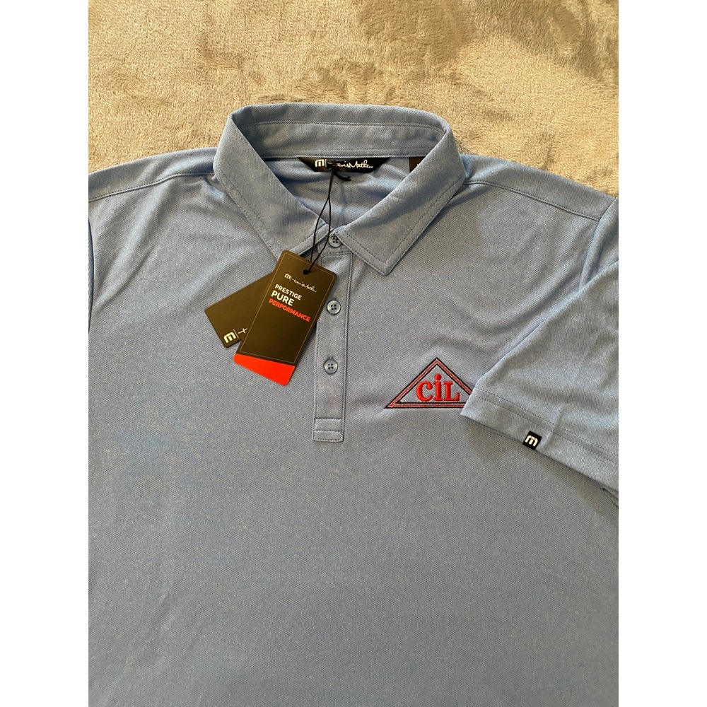 TravisMathew Polo Mens M Blue Coto Performance Stretch Quick Dry CIL Logo NEW